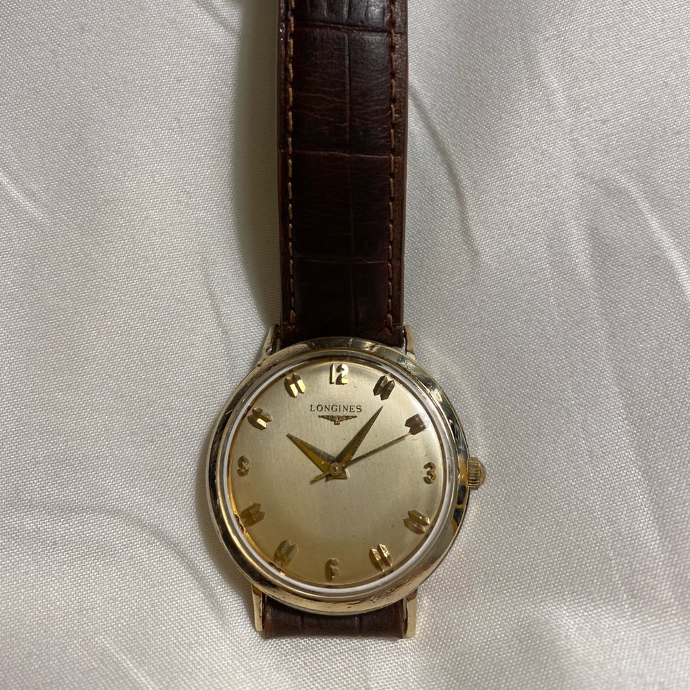 Gold Longines Watch Conquest
